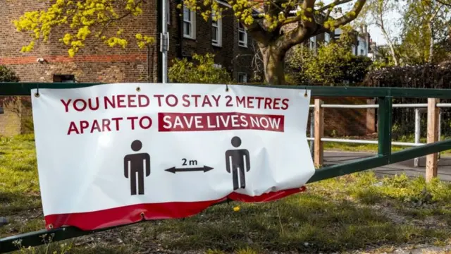 two metres rule banner