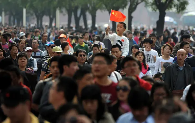 This picture shows thousands of visitors making their way to the Forbidden City in Beijing, during "Golden Week"