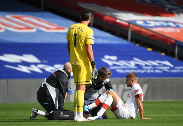 Southampton's Jack Stephens receives treatment