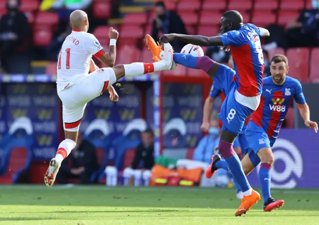 Crystal Palace's Cheikhou Kouyate in action with Southampton's Nathan Redmond