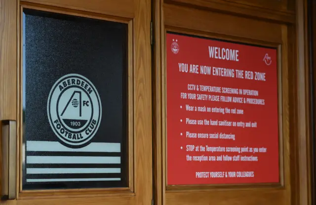 Signs at Pittodrie Stadium