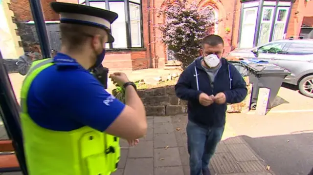 Police checking bus users for masks