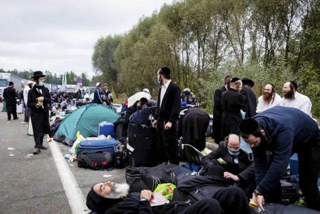 Hasidic Jewish pilgrims are gathered on the Ukraine-Belarus border