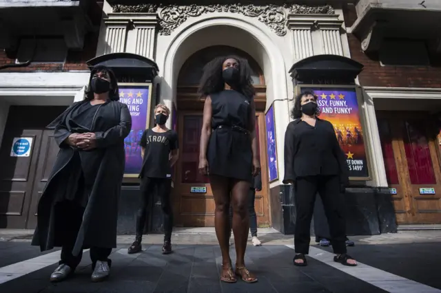 Beverley Knight, Dawn French and others outside a theatre