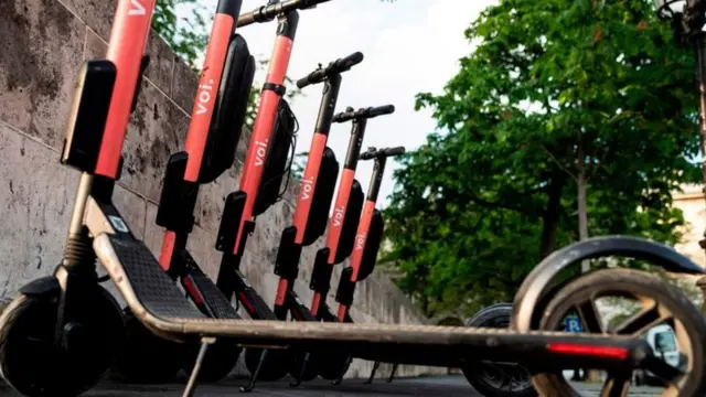 A line of e-scooters