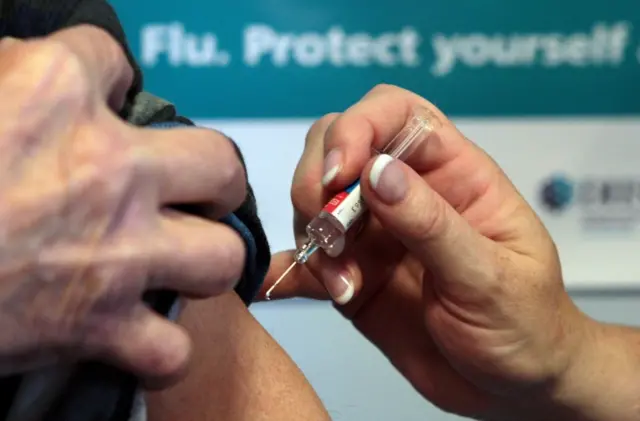 Person getting flu jab