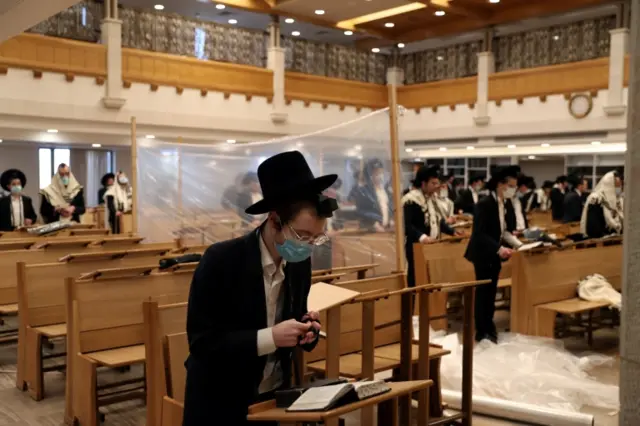 Worshippers at a morning service in Jerusalem