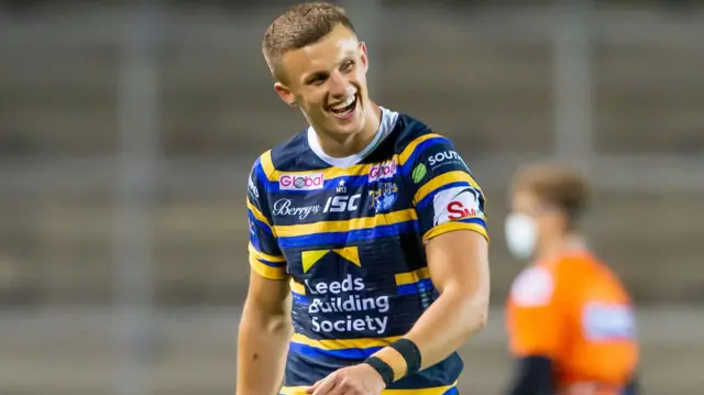 Ash Handley smiles after his try