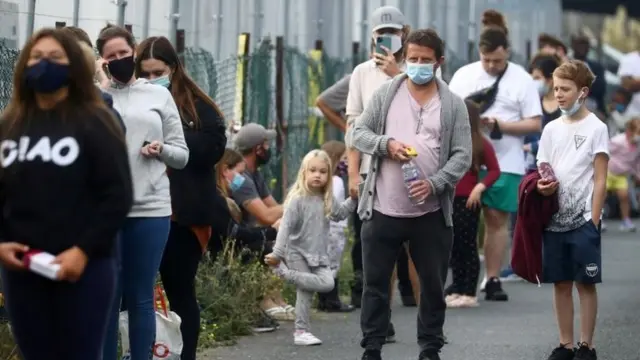A queue at a testing site in England