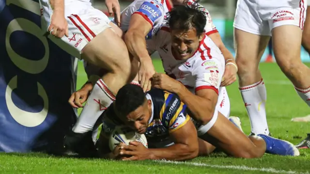 Kruise Leeming scores for Leeds just before half-time