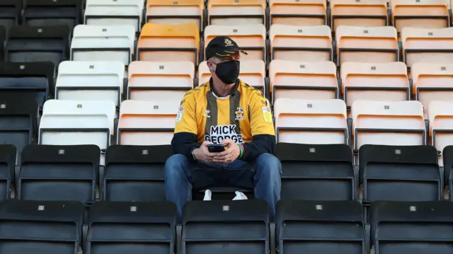 A Cambridge United fan at a trial event