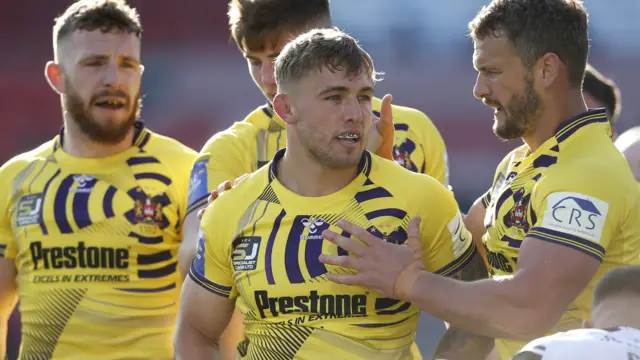 Wigan celebrate try