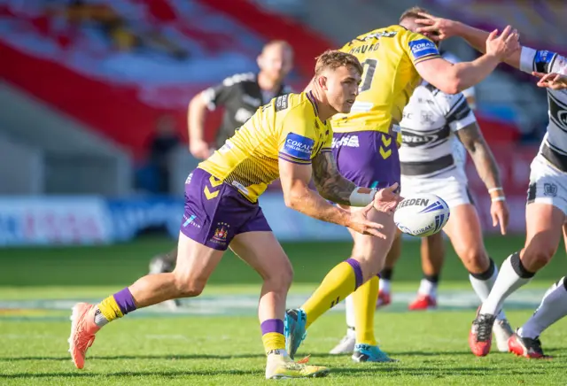 Wigan's Sam Powell passes