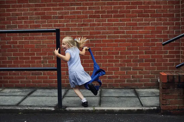 Primary school girl running