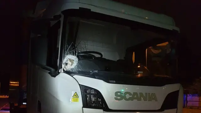 Smashed lorry windscreen