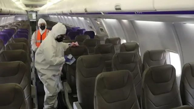 File photo of interior of a plane being cleaned