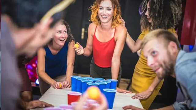 People playing beer pong