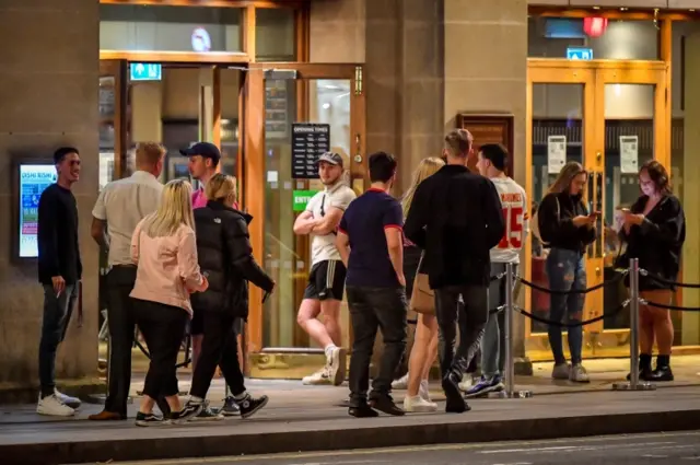 A queue outside a pub in Cardiff