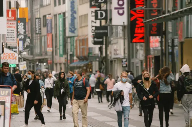 A busy high street in Cologne, Germany