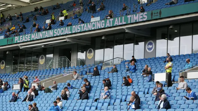 Spectators at a Brighton versus Chelsea friendly match