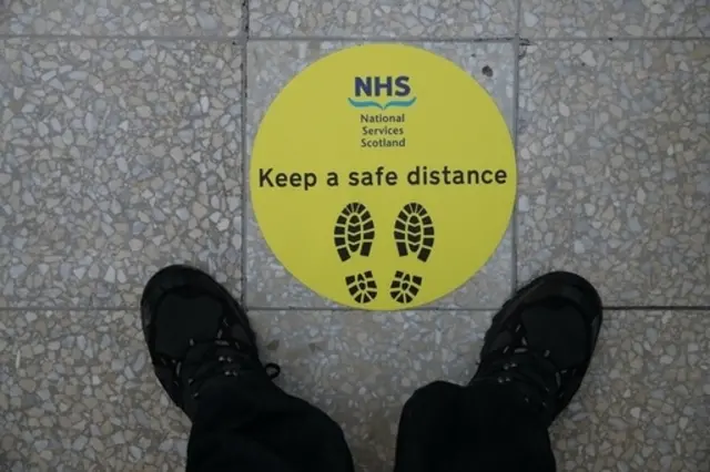 Social distancing NHS sign