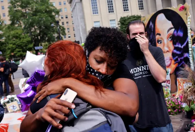 protesters react