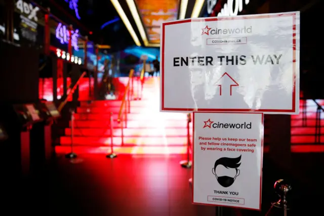 Cineworld cinema with signs about mask-wearing