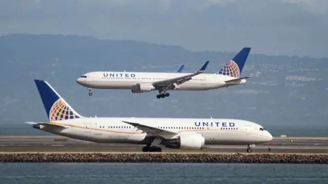 Two United Airlines planes pictured at San Francisco International Airport (file photo)