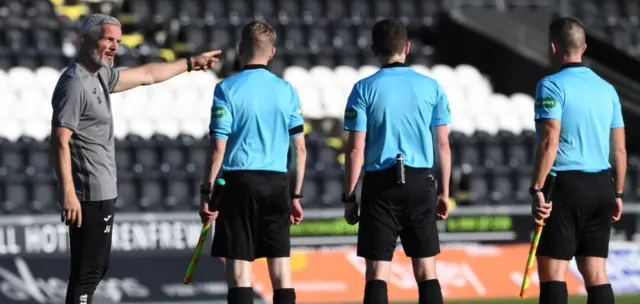 St Mirren manager Jim Goodwin has a word with the officials at full-time