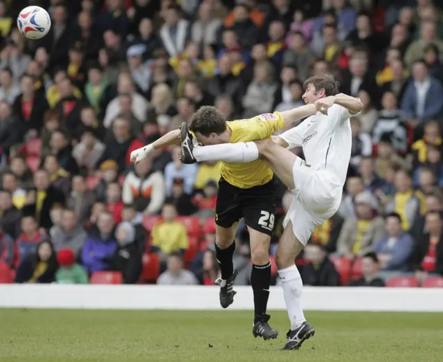 Darius Henderson and Russell Perrett tussle in the last meeting