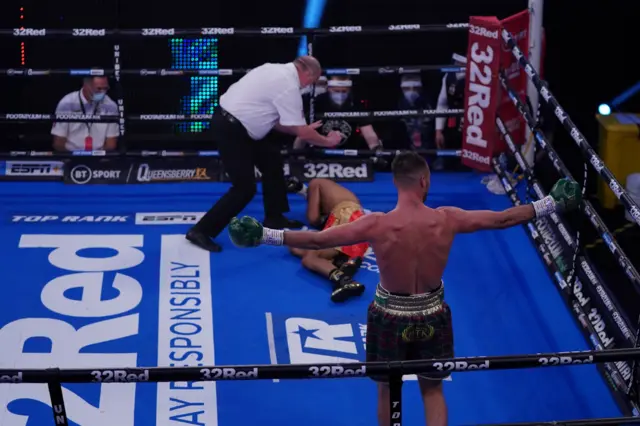 Josh Taylor celebrates after knocking out Apinun Khongsong