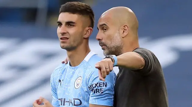 Pep Guardiola and Ferran Torres