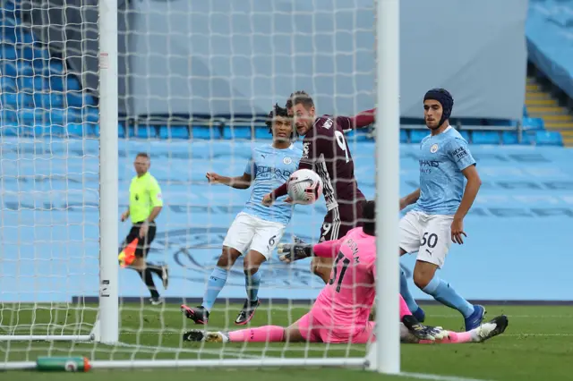 Jamie Vardy scores against Manchester City