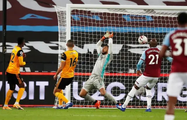 Tomas Soucek heads home West Ham's third goal against Wolves