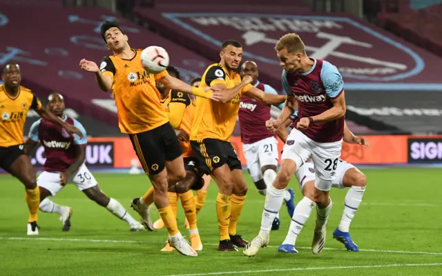 Tomas Soucek heads home West Ham's third goal against Wolves