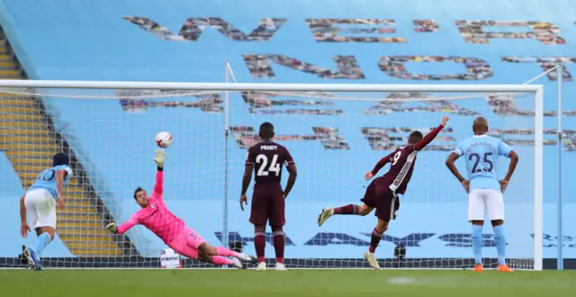 Leicester City's Jamie Vardy scores their first goal from the penalty spot