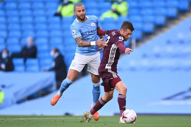 Manchester City's Kyle Walker fouls Leicester's Jamie Vardy to give away a penalty