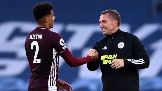 Brendan Rodgers celebrates with James Justin