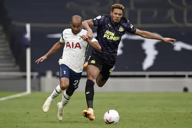 Newcastle's Joelinton fouls Tottenham's Lucas Moura