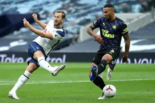 Tottenham's Harry Kane has a shot saved against Newcastle