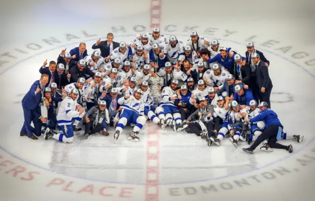 The Tampa Bay Lightning pose with the Stanley Cup after defeating the Dallas Stars, 28 September 2020