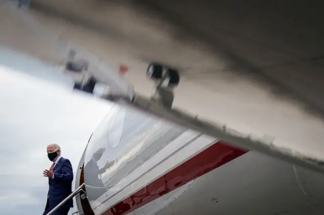 Democratic presidential nominee and former Vice-President Joe Biden exits his plane upon arrival at Orlando International Airport on September 15, 2020 in Orlando, Florida