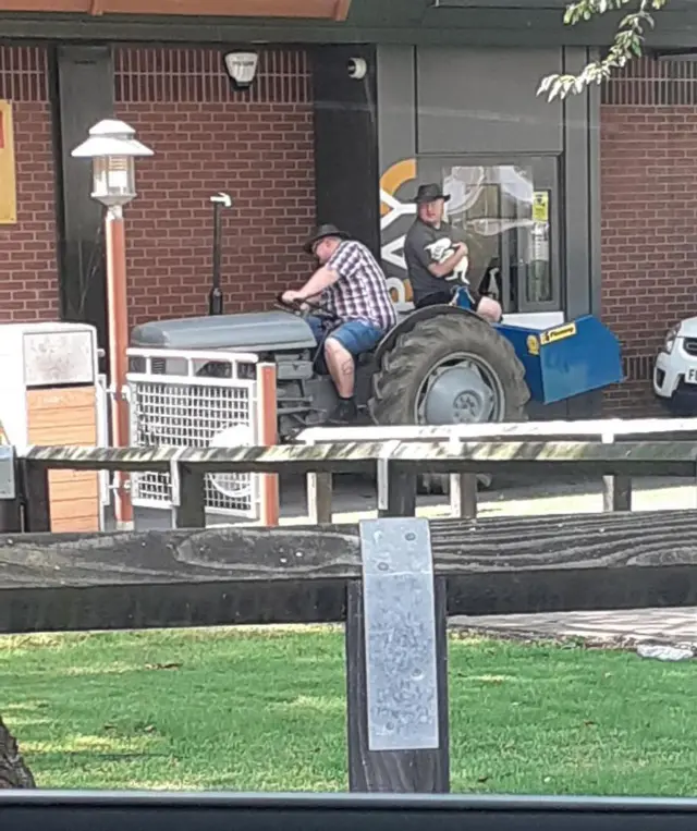 Man on a tractor at McDonalds