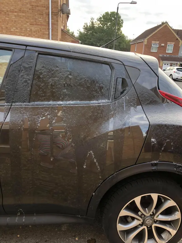 Car damaged with corrosive substance