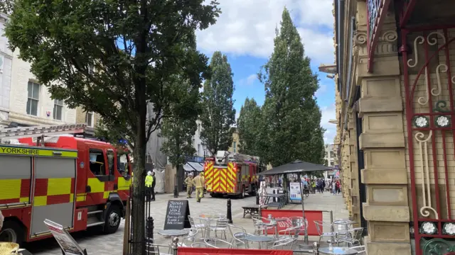 Firefighters at the collapse