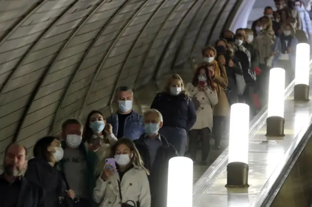 Masked commuters on the Moscow underground on 30 September 2020