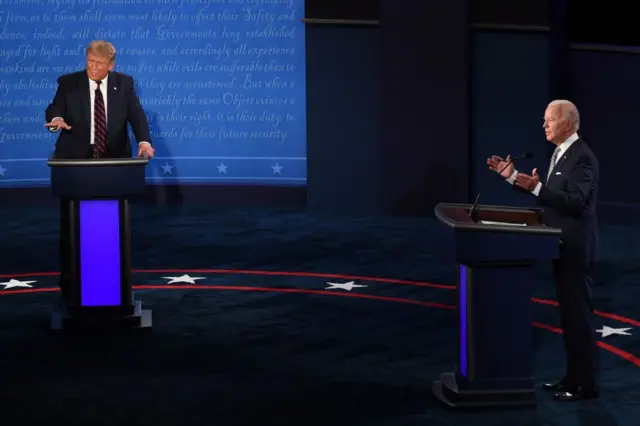 Democratic Presidential candidate and former US Vice-President Joe Biden (R) and US President Donald Trump take part in the first presidential debate at Case Western Reserve University and Cleveland Clinic in Cleveland, Ohio, on September 29, 2020