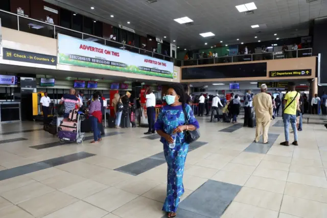 A woman wears a mask at Lagos airport, Nigeria. File photo