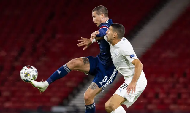 Lyndon Dykes playing for Scotland against Israel