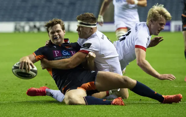 Chris Dean scores a try for Edinburgh against Ulster